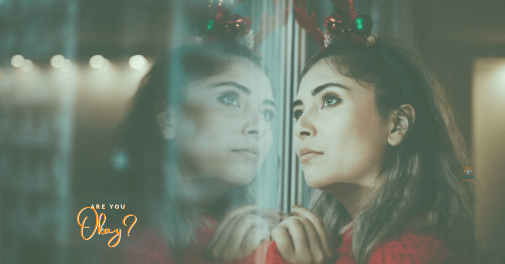 are you ok? woman looking into a window